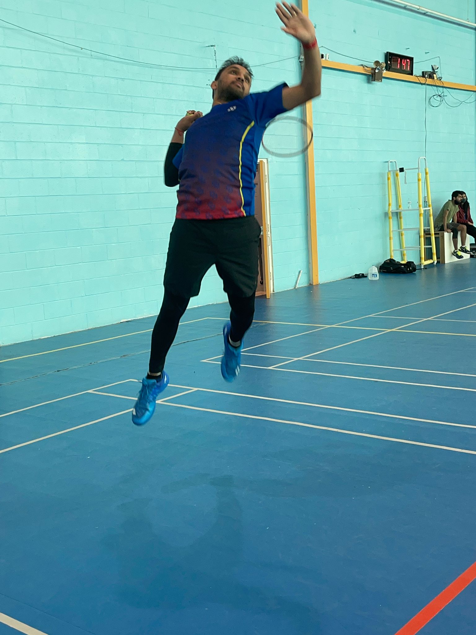 Coach Pavan Komal on the badminton court