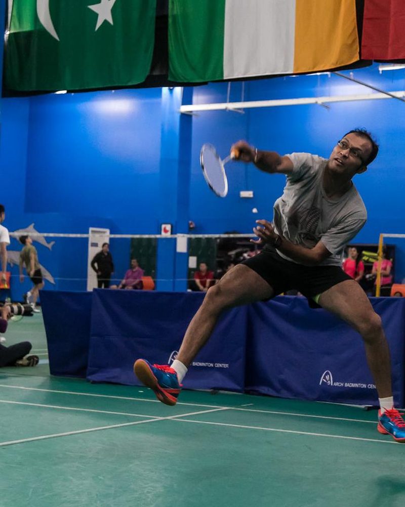 Coach Supratik Dutta mid-smash on the badminton court